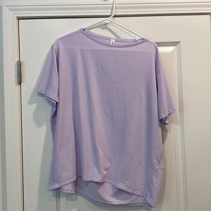 Lululemon back in action shirt. Washed but never worn! Color is lavender dew